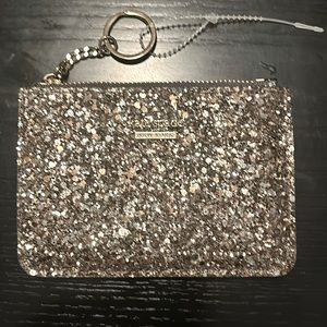 Kate Spade silver & bronze shimmering keychain wristlet.